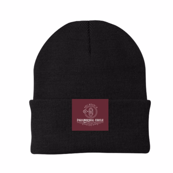 Black woven beanie hat with embroidered Paranormal Circle logo badge, designed for warmth and style.